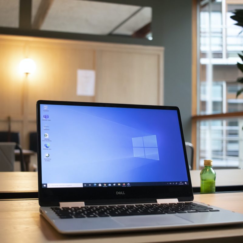Microsoft laptop open on desktop