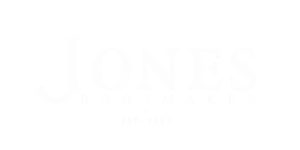 Jones logo in white text with "Est. 1985" tagline, displayed on a transparent background.