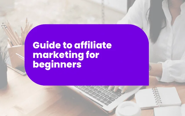 Affiliate marketing guide for beginners banner over a person typing on a laptop at a desk
